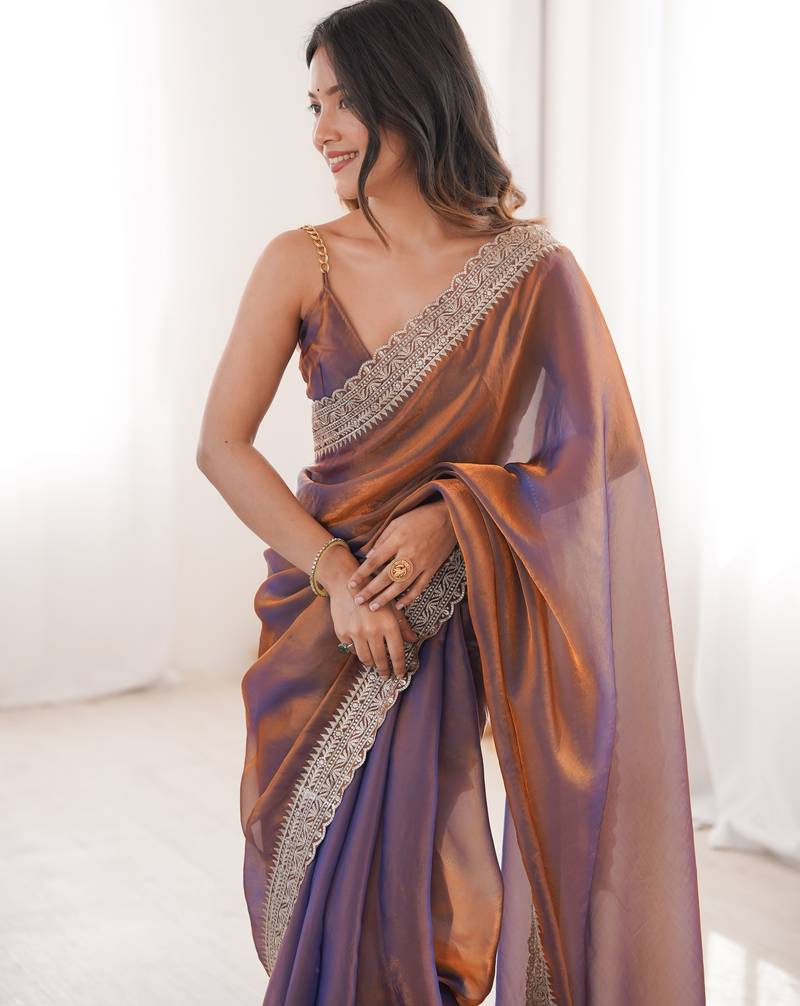 Rust tissue embridered saree with unstitched blouse piece