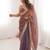 Rust tissue embridered saree with unstitched blouse piece