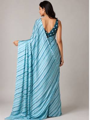 Firozi color all over traditional modern leheriya prints work japan satin saree with unstitched blouse 3