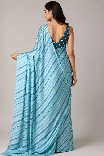 Firozi color all over traditional modern leheriya prints work japan satin saree with unstitched blouse