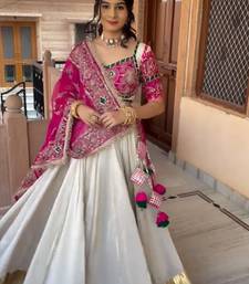 Off White & Rani Pink Heavy Thread Embroidery Sequins Work Roman Silk Navratri Lehenga Choli with Dupatta