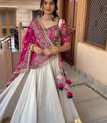 Off White & Rani Pink Heavy Thread Embroidery Sequins Work Roman Silk Navratri Lehenga Choli with Dupatta