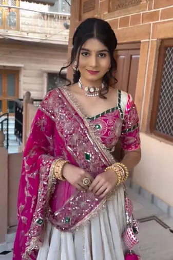 Off White & Rani Pink Heavy Thread Embroidery Sequins Work Roman Silk Navratri Lehenga Choli with Dupatta