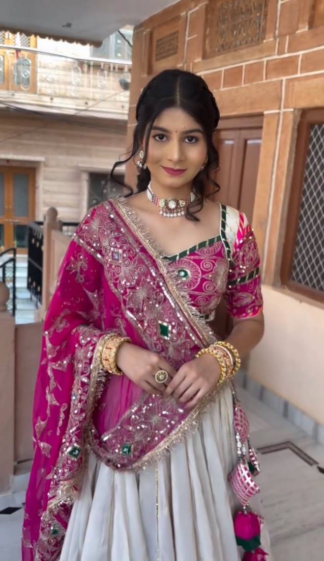 Off White & Rani Pink Heavy Thread Embroidery Sequins Work Roman Silk Navratri Lehenga Choli with Dupatta