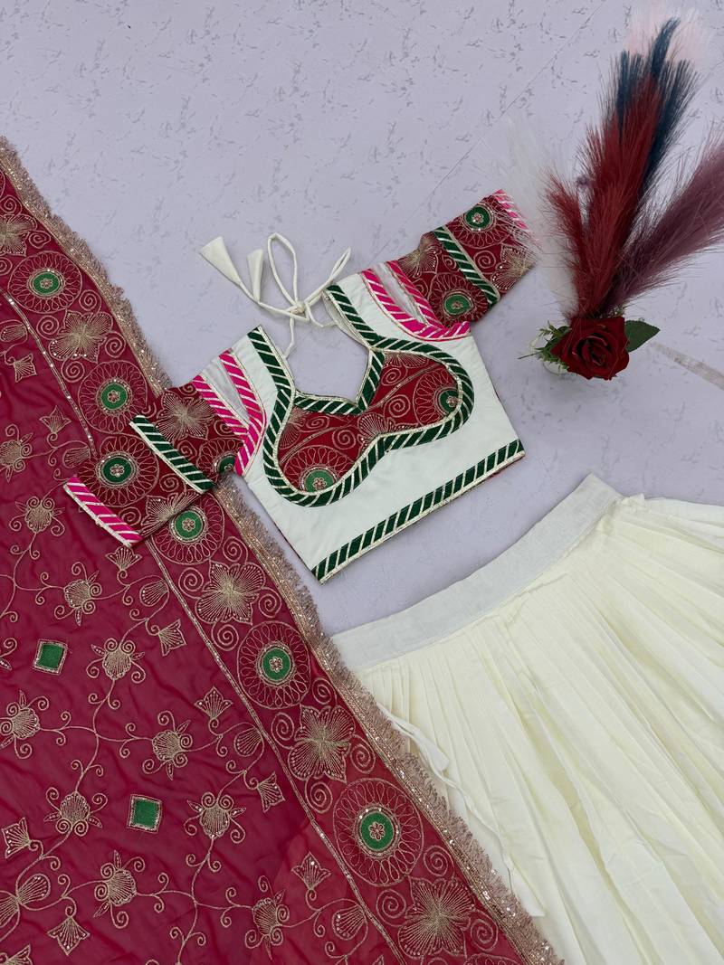 Off White & Rani Pink Heavy Thread Embroidery Sequins Work Roman Silk Navratri Lehenga Choli with Dupatta