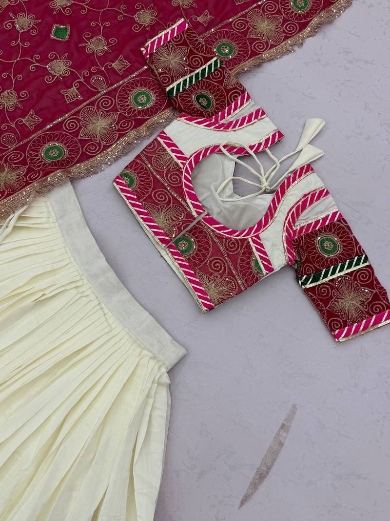 Off White & Rani Pink Heavy Thread Embroidery Sequins Work Roman Silk Navratri Lehenga Choli with Dupatta