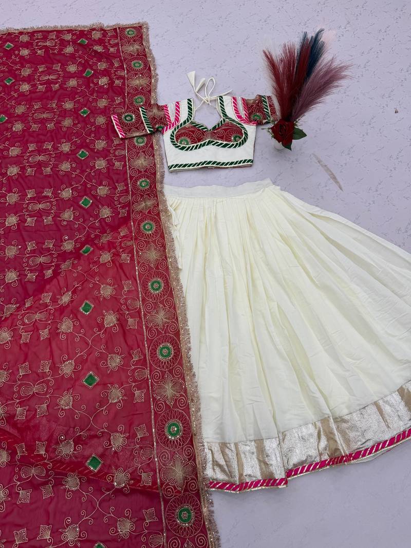 Off White & Rani Pink Heavy Thread Embroidery Sequins Work Roman Silk Navratri Lehenga Choli with Dupatta