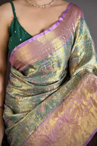 Green kanjeevaram silk blend zari woven saree with unstitched blouse piece
