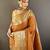 Orange nylon viscose zari woven saree with unstitched blouse piece