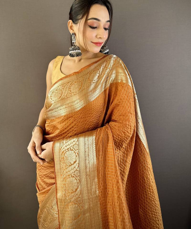 Orange nylon viscose zari woven saree with unstitched blouse piece