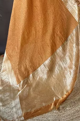 Orange nylon viscose zari woven saree with unstitched blouse piece