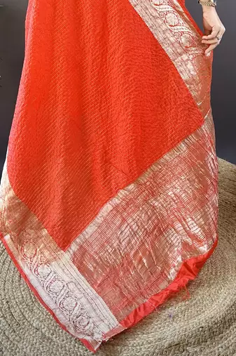 Red nylon viscose zari woven saree with unstitched blouse piece