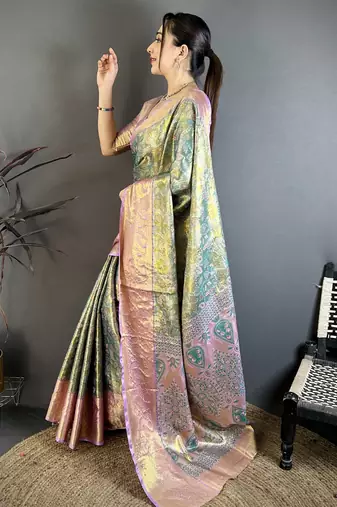 Green tissue zari woven saree with unstitched blouse piece