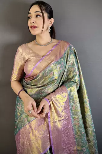 Green tissue zari woven saree with unstitched blouse piece
