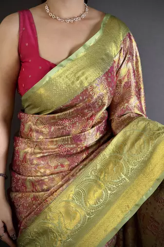 Rust tissue zari woven saree with unstitched blouse piece