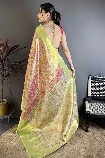 Rust tissue zari woven saree with unstitched blouse piece