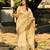 Cream tussar silk embroidered zari woven saree with unstitched blouse piece