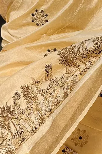 Cream tussar silk blend embroidered zari woven saree with unstitched blouse piece