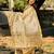 Cream tussar silk embroidered zari woven saree with unstitched blouse piece