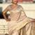 Cream tussar silk zari woven saree with unstitched blouse piece