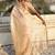 Cream tussar silk zari woven saree with unstitched blouse piece