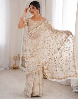 Cream tissue embridered saree with unstitched blouse piece 1