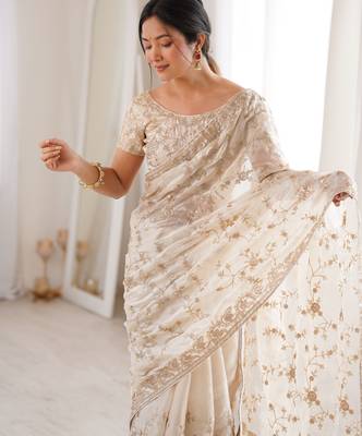 Cream tissue embridered saree with unstitched blouse piece 2