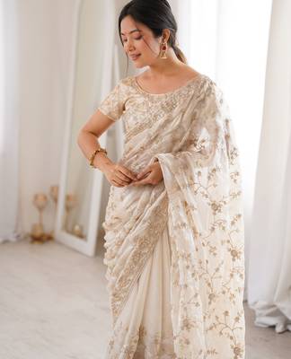 Cream tissue embridered saree with unstitched blouse piece 3