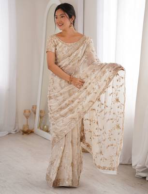 Cream tissue embridered saree with unstitched blouse piece 4