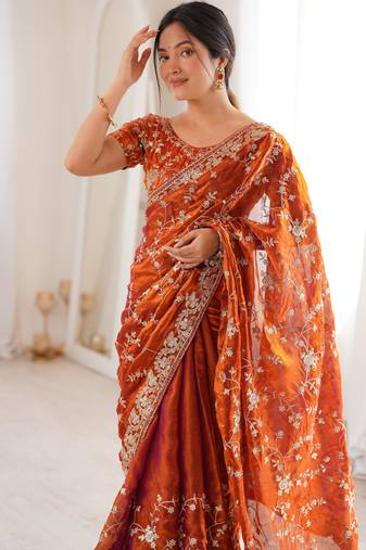 Orange tissue embridered saree with unstitched blouse piece