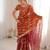 Orange tissue embridered saree with unstitched blouse piece