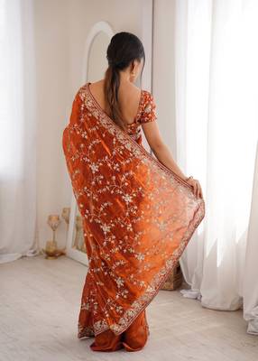 Orange tissue embridered saree with unstitched blouse piece 3