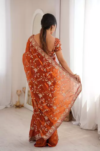 Orange tissue embridered saree with unstitched blouse piece