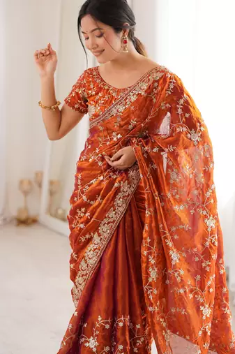 Orange tissue embridered saree with unstitched blouse piece