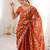 Orange tissue embridered saree with unstitched blouse piece