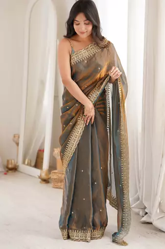 Gold tissue embridered saree with unstitched blouse piece