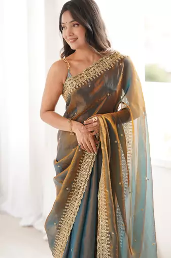 Gold tissue embridered saree with unstitched blouse piece