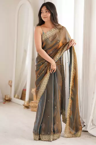 Gold tissue embridered saree with unstitched blouse piece