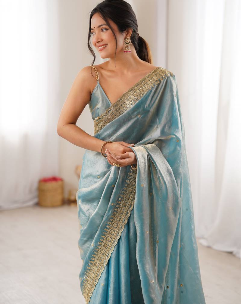 Sky blue tissue embridered saree with unstitched blouse piece