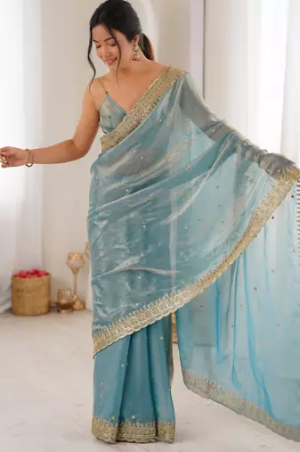 Sky blue tissue embridered saree with unstitched blouse piece