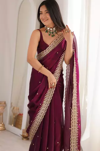 Wine tissue embridered saree with unstitched blouse piece