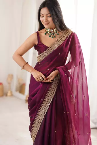 Wine tissue embridered saree with unstitched blouse piece