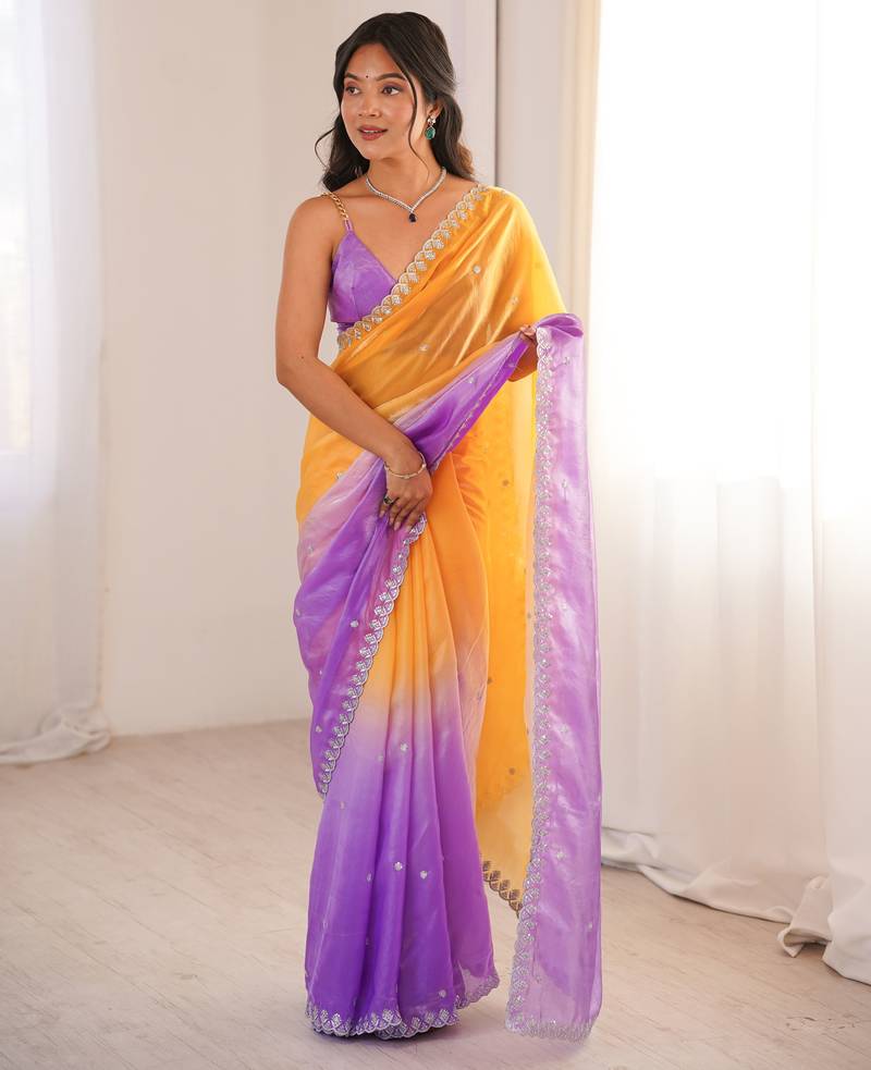 Yellow & purple tissue embridered saree with unstitched blouse piece