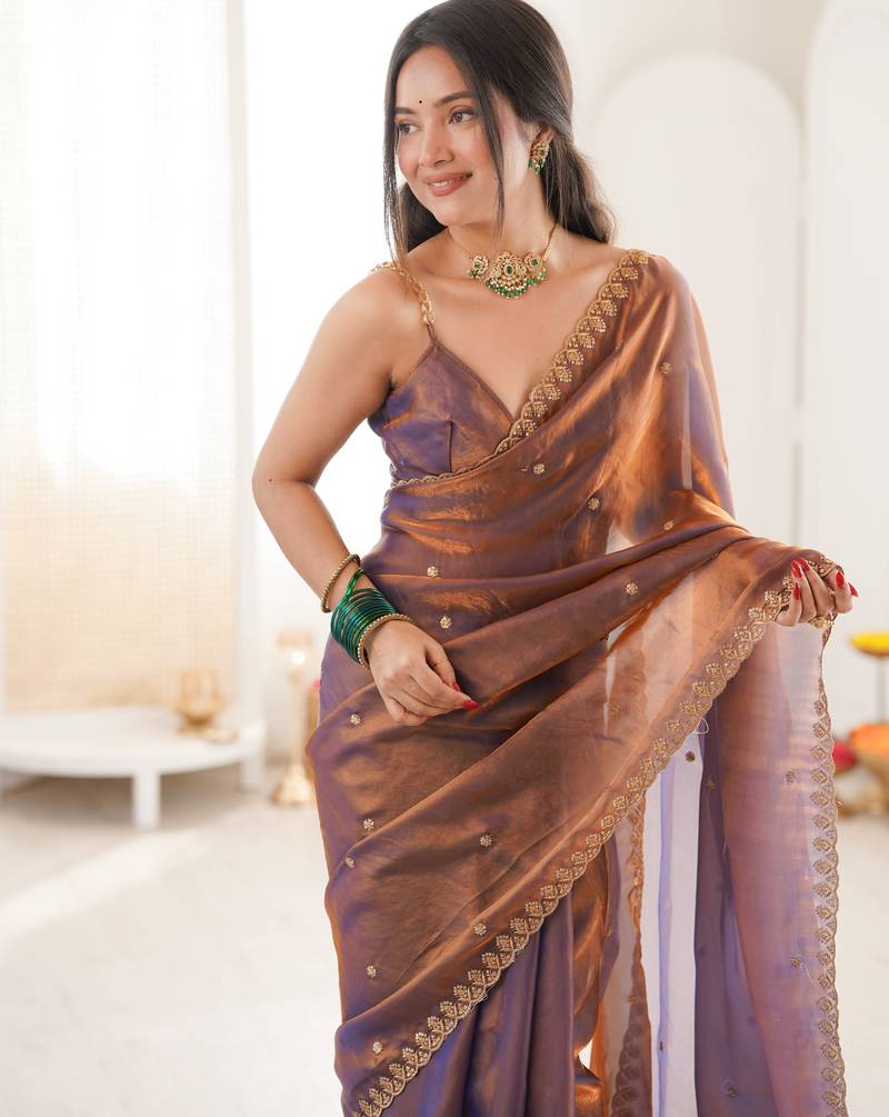 brown tissue embridered saree with unstitched blouse piece