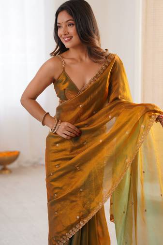 gold tissue embridered saree with unstitched blouse piece