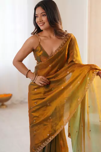 gold tissue embridered saree with unstitched blouse piece