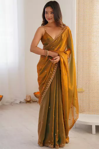 gold tissue embridered saree with unstitched blouse piece