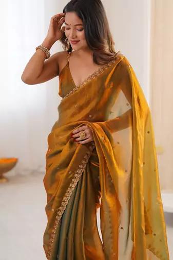 gold tissue embridered saree with unstitched blouse piece