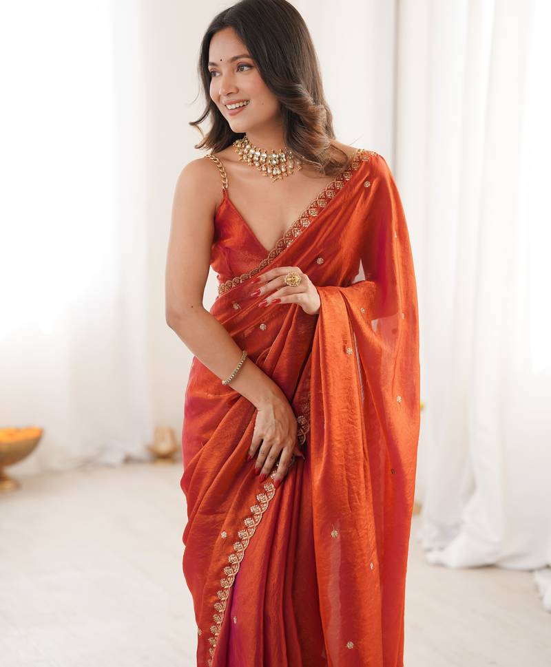 orange tissue embridered saree with unstitched blouse piece