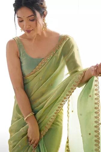 pista tissue embridered saree with unstitched blouse piece